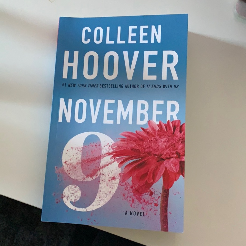 November 9 Paperback - Blue Cover with Pink Flower